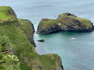 Carrick-a-Rede rope bridge is a beautiful location and served as inspiration for a memorable scene in Game of Thrones.